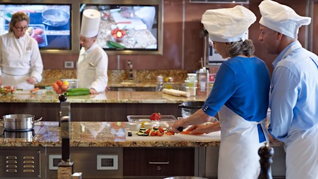 Guests in the Culinary Centre on Oceania Marina.