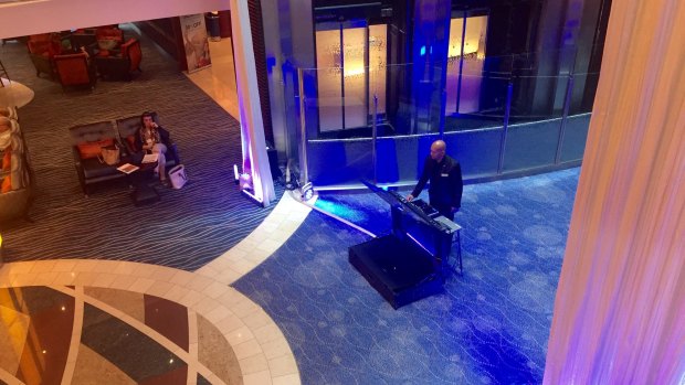 Miami vibes: The lobby DJ is there to entertain on the Celebrity Solstice.