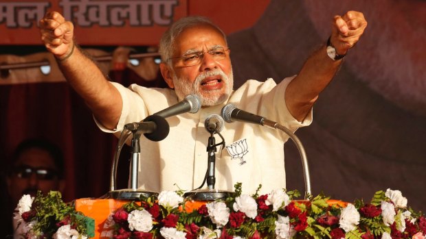 Narendra Modi addresses an election rally in Allahabad, Uttar Pradesh. His attempts to curb corruption, counterfeiting and the black economy will weigh on the polls.