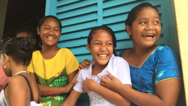 Tuvaluan girls outside church.
