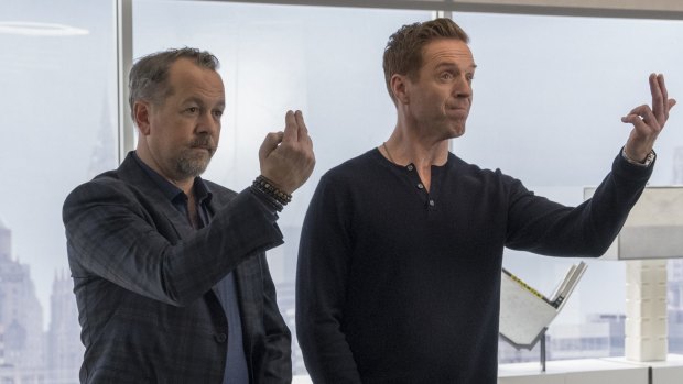 David Costabile as Mike "Wags" Wagner and Damian Lewis as Bobby Axelrod in Billions.