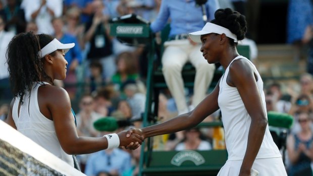 Venus Williams shakes hands with Japan's Naomi Osaka after the match.