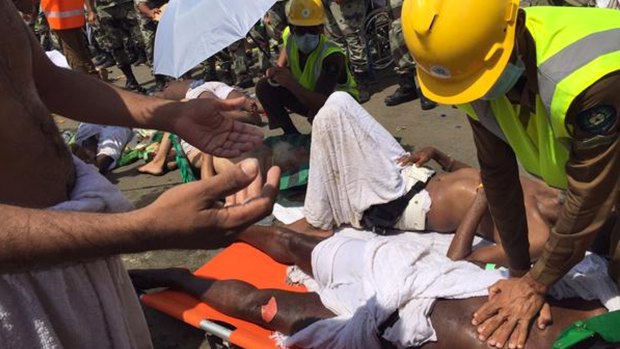 A pilgrim is treated by a medic after the September 24 stampede in Mina, now believed to have claimed the lives of more than 2400 people.