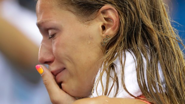 Russia's Yulia Efimova cries after placing second in the women's 100m breaststroke final. 