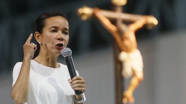 Rodrigo Duterte's main rival in the May 9 presidential elections, senator Grace Poe, addresses a prayer vigil in Paranaque City south of Manila.