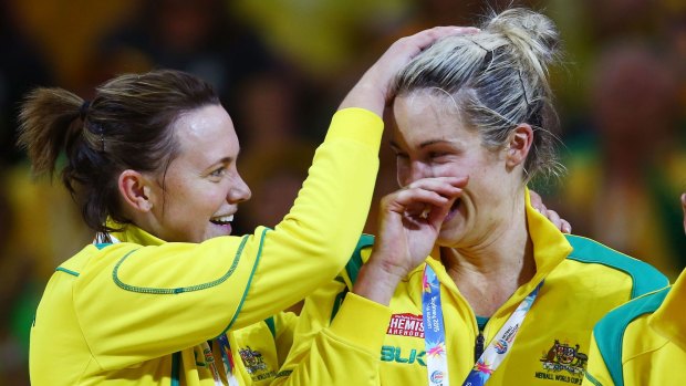 Julie Corletto (right) of the Diamonds celebrates with Natalie Medhurst (left) after the final.