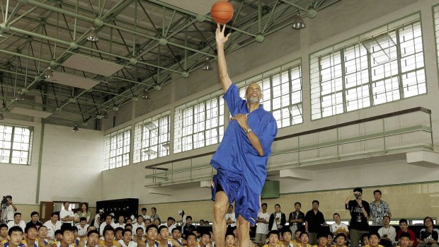 Kareem Abdul-Jabbar teaches young Chinese players at a camp in Shanghai in May 2005.