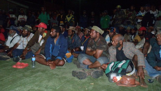 A meeting of the PNG landowners before the deal was struck.