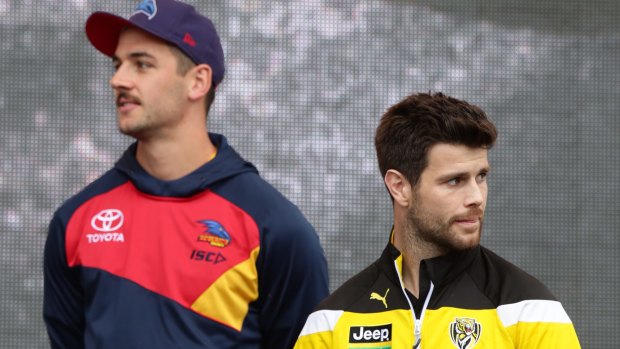 Walker and hunter: Taylor Walker and Trent Cotchin on Friday.