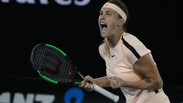 Aryna Sabalenka of Belarus reacts during her first-round match against Australia's Ashleigh Barty at the Australian Open.