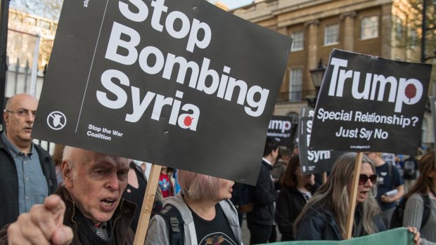 Protesters against the US strike at a Stop the War Coalition demonstration opposite Downing Street, London, on Friday.