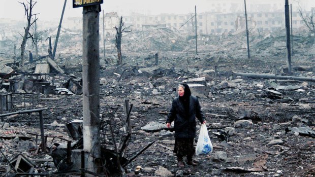 A Chechen woman in downtown Grozny after Putin's liberation announcement in February 2000.