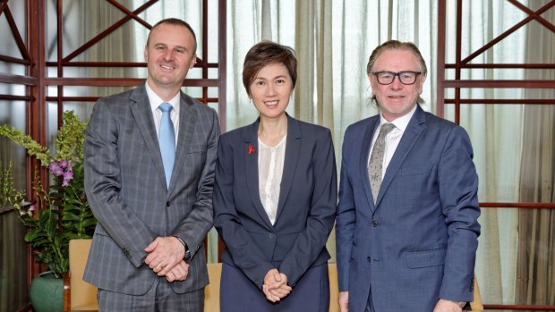 Chief Minister Andrew Barr with Singapore's Senior Minister of State Josephine Teo and Australian High Commissioner Philip Green this week.