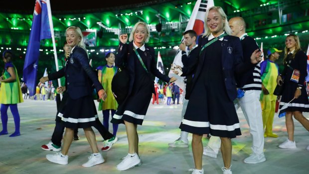 Triplets Liina, Lily and Leila Luik from Estonia arrive during the closing ceremony in the Maracana stadium at the 2016 Summer Olympics in Rio de Janeiro, Brazil, Sunday, Aug. 21, 2016.