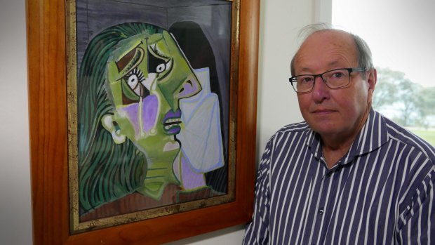 Former National Gallery of Victoria chief conservator Thomas Dixon with a homage to Picasso's Weeping Woman given to him for his 70th birthday.