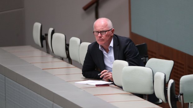 Veteran journalist Michael Gordon observes Question Time at Parliament House in Canberra. 