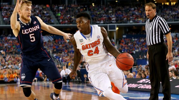 On the move: Perth Wildcats recruit Casey Prather drives for the Florida Gators against the Connecticut Huskies during the NCAA Men's Final Four Semifinal.