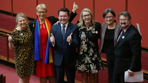 Senator Dean Smith with Senators Louise Pratt, Janet Rice, Skye Kakoschke-Moore, Penny Wong and Derryn Hinch after the introduction of the Marriage Amendment Bill on Wednesday.