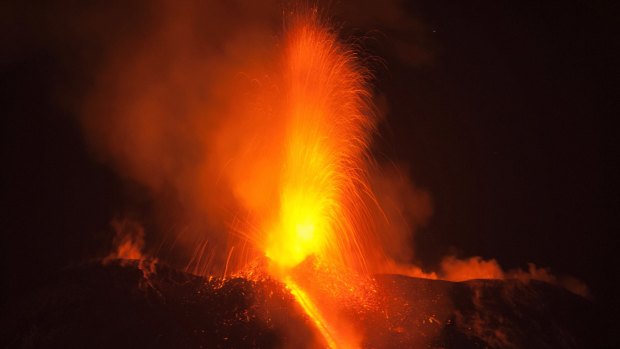 Mount Etna, Europe's most active volcano, spews lava during an eruption, near the Sicilian town of Catania, southern Italy, on Tuesday.