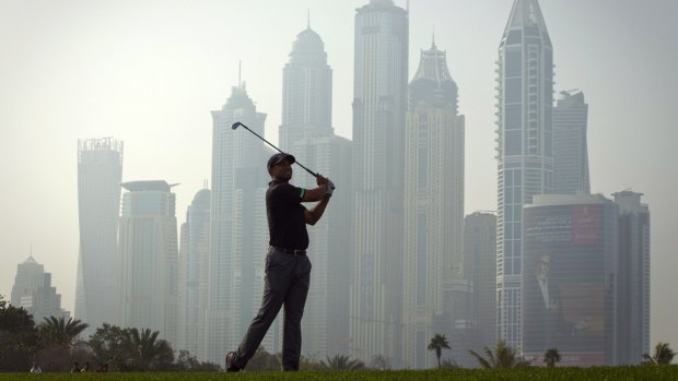Downturn: Tiger Woods in action during the Dubai Desert Classic in January.