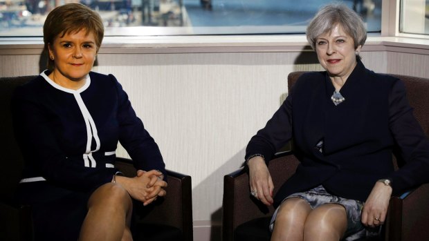 Britain's Prime Minister Theresa May, right, and Scotland's First Minister Nicola Sturgeon 