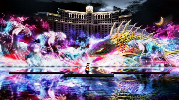 A koi carp hologram is projected onto a water screen behind a Japanese Kabuki dancer at a Las Vegas casino.