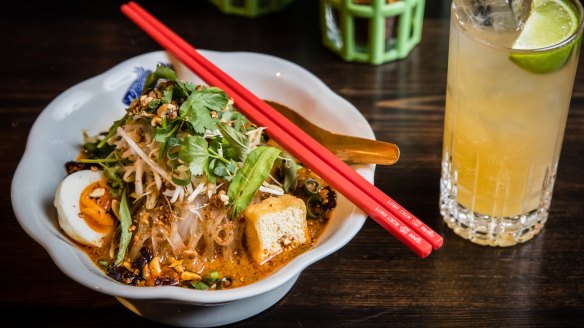 Bean curd laksa with a house-made soda at Long Chim.