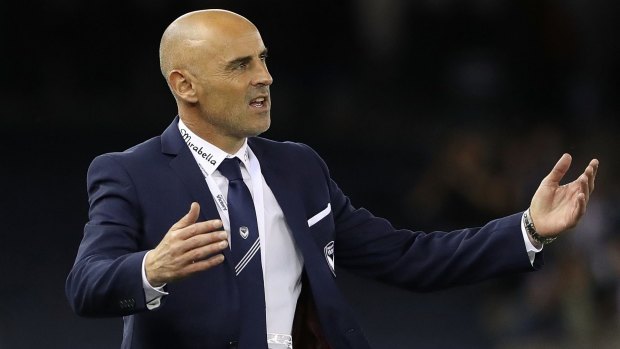 Fever pitch: Victory coach Kevin Muscat reacts after a receiving derby drubbing at the hands of crosstown rivals City.