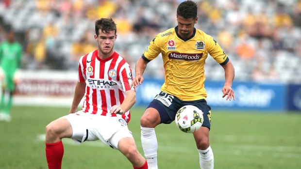 The return of Connor Chapman (left), seen here contesting the ball with Fabio Ferreira of the Mariners, will give Melbourne City a boost.