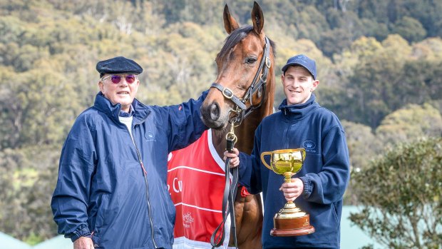 Lloyd Williams and strapper Joe Flannery with Melbourne Cup winner Almandin in 2016. 