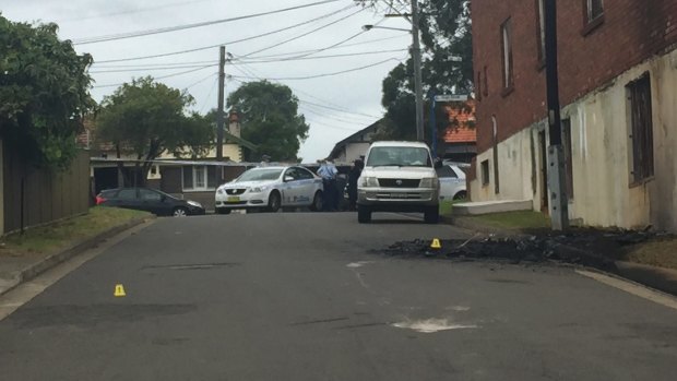 The getaway car used in the shooting at Mortlake on Friday morning was found burnt out in an industrial area in Belmore in Sydney's south-west.  