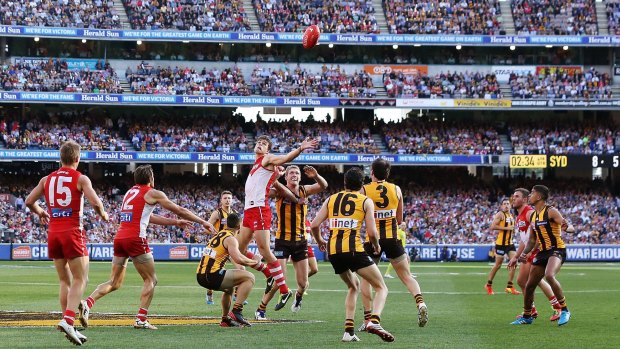 The Hawks brought incredible pressure in the opening term of the 2014 grand final against the Swans.