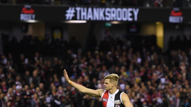 Fitting finale: Nick Riewoldt salutes the crowd after St Kilda's win over North in their last home game of 2017 at Etihad Stadium.