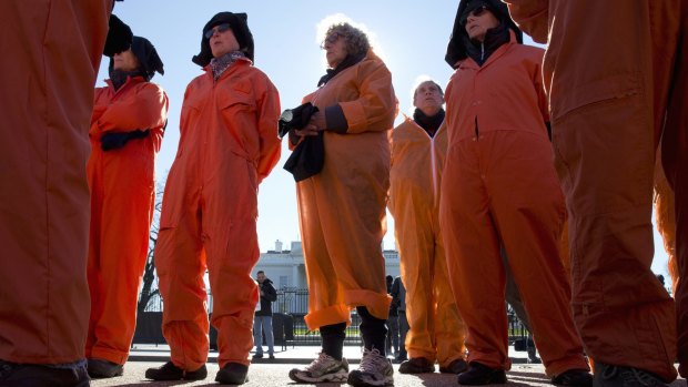 Protesters wearing orange jumpsuits outside the White House last month.