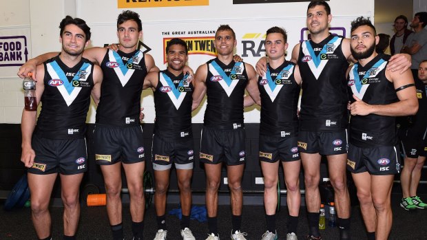The seven indigenous players who turned out for Port Adelaide against Fremantle on Saturday (from left): Chad Wingard, Brendon Ah Chee, Jake Neade, Nathan Krakouer, Karl Amon, Paddy Ryder and Jarman Impey.