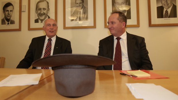 If the hat fits... outgoing Deputy Prime Minister Warren Truss and his replacement Barnaby Joyce.