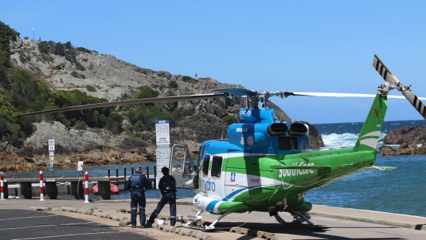Emergency crews were called out to Tathra after a group of fishermen were swept off the rocks.