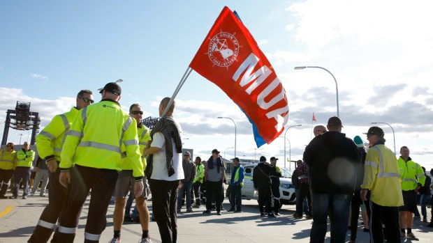 Hutchison Ports Australia's workers gather at Port Botany, Sydney, after being sacked by email.