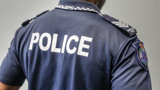A police officer was taken to hospital after allegedly being attacked while breaking up a brawl.