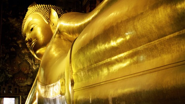 Wat Pho temple and the reclining Buddha in Bangkok, Thailand.



Reclining Buddha, Wat Po, Bangkok, Thailand
