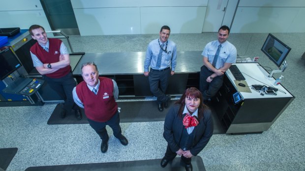 The team behind the scenes at the biosecurity unit at Canberra Airport. Biosecurity officers (from left) Casey, Peter, Osorio, Cristina and Chris. 