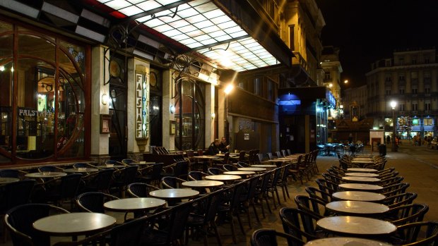 Empty tables outside a restaurant on Rue Henri Maus in Brussels on Monday. 
