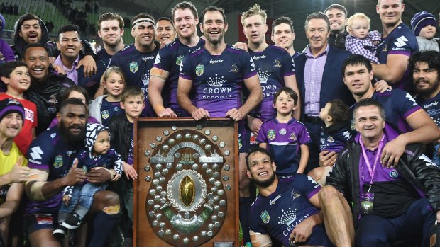 Sitting pretty: Storm players pose with the JJ Giltinan Shield.