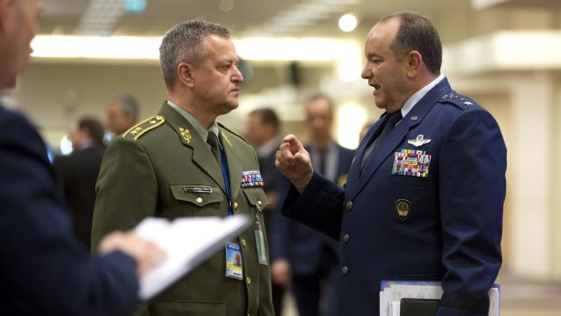 Supreme Allied Commander Europe, General Philip Breedlove, right, speaks with Czech Republic's NATO-EU military representative Major-General Miroslav Zizka, prior to a two-day meeting of NATO defence ministers in Brussels on Wednesday.
