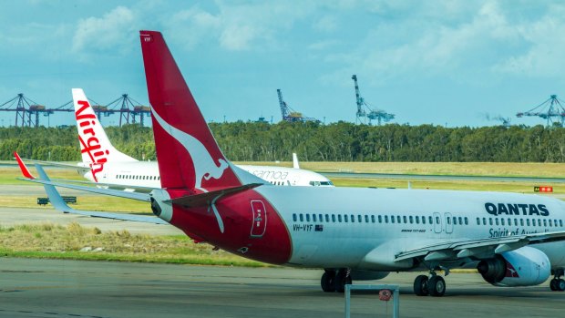 Qantas claims airports resort to monopolistic tactics in negotiations with airlines over charges.