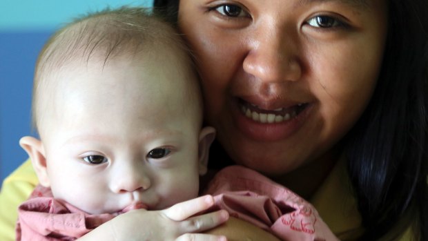 Australian rights: Baby Gammy, with Thai surrogate mother Pattaramon Chanbu, has a biological Australian father.