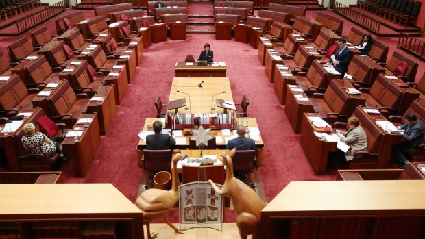 Lone stand: Senator Zed Seselja speaks in a near-empty Senate on Monday.