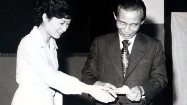 Then South Korean President Park Chung-hee, right, and his daughter, Park Geun-hye, cast ballots in Seoul in 1977.