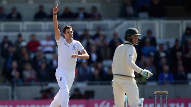 Brilliant bowling display ... Steven Finn celebrates dismissing Australian captain Michael Clarke during day two of the Ashes Test at Edgbaston.