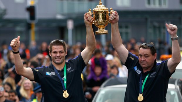 Going out on a high: All Black captain Richie McCaw and coach Steve Hansen hold the Webb Ellis Cup aloft during welcome home celebrations earlier this month.